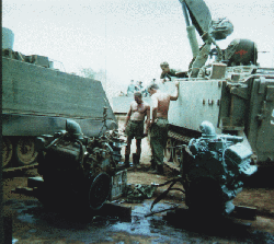 Personnel carier undergoing engine change at Nui Dat