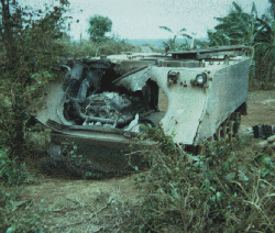 M113 carrier after hit by recoiless rifle